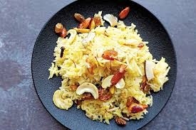 Modur Pulao, a sweet rice dish with dry fruits and ghee